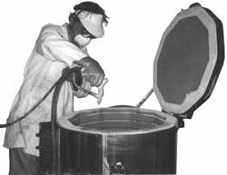 Spraying ITC Ceramic Coating in a kiln